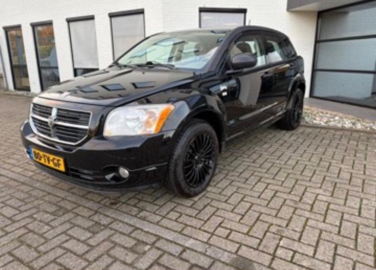 Dodge Caliber 1.8 benzine 2007 Zwart APK, Auto's, Voorwielaandrijving, 450 kg, 1295 kg, Zwart