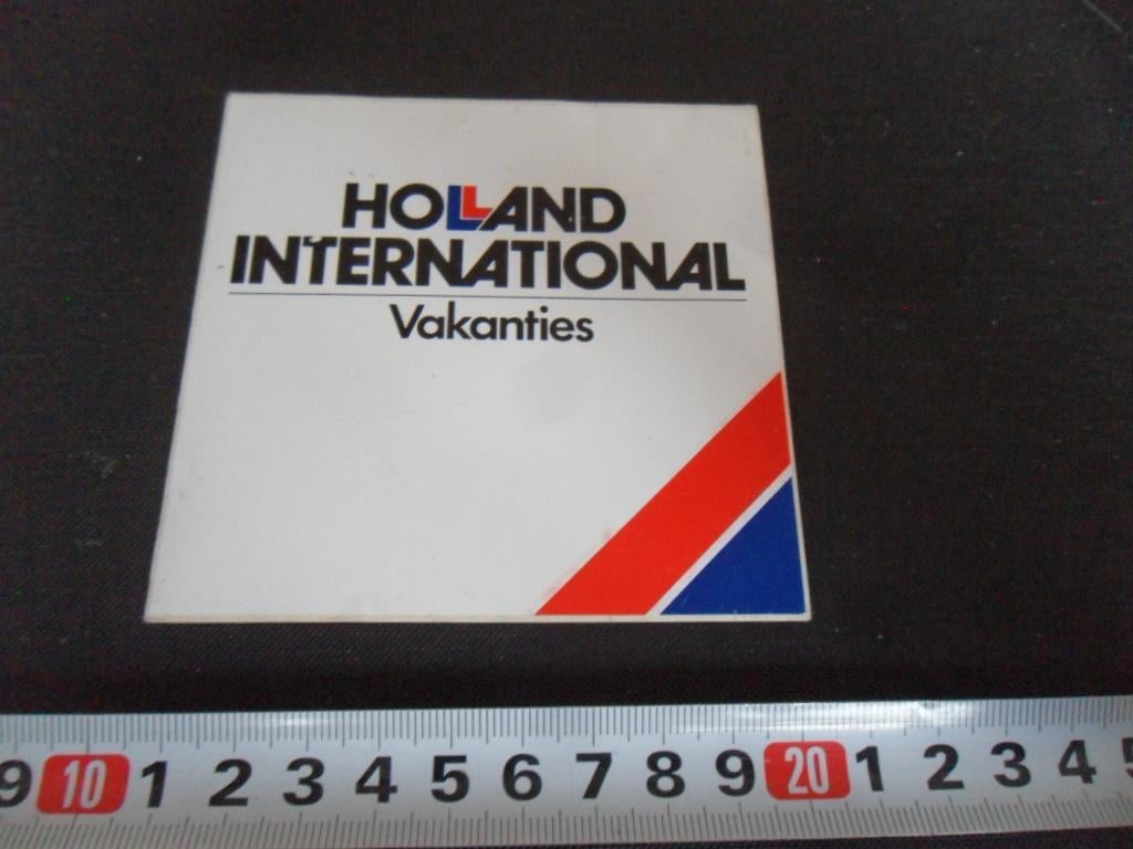sticker Holland International Vakanties, Ophalen, Zo goed als nieuw