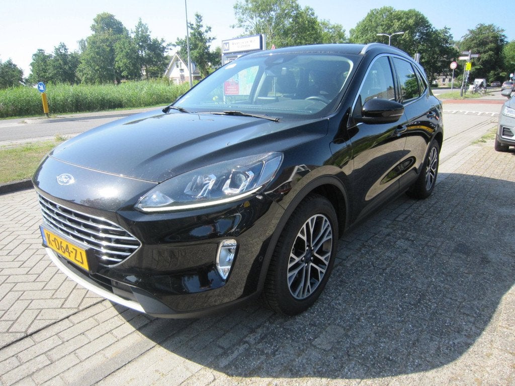 Ford Kuga 2.5 PHEV Titanium aut trekh, Auto's, Gebruikt, 4 cilinders, Zwart, 152 pk