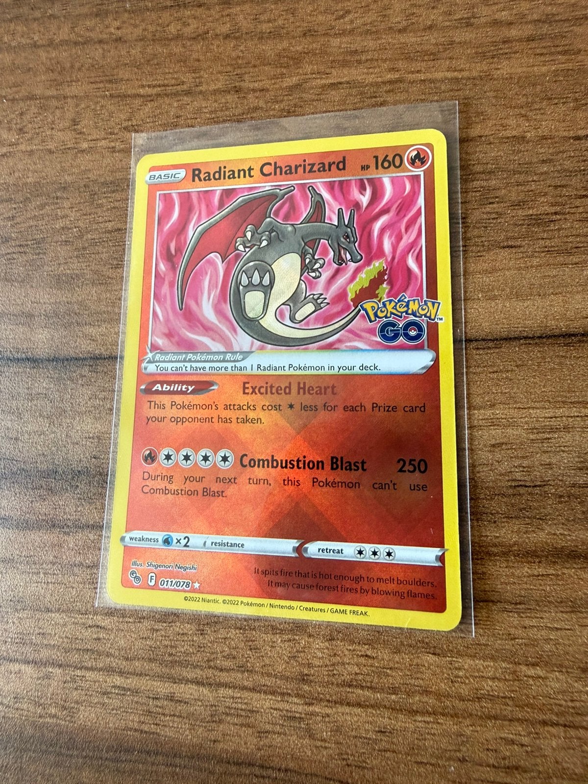 Radiant Charizard 011/078 Pokemon Go NM / M, Ophalen of Verzenden, Zo goed als nieuw