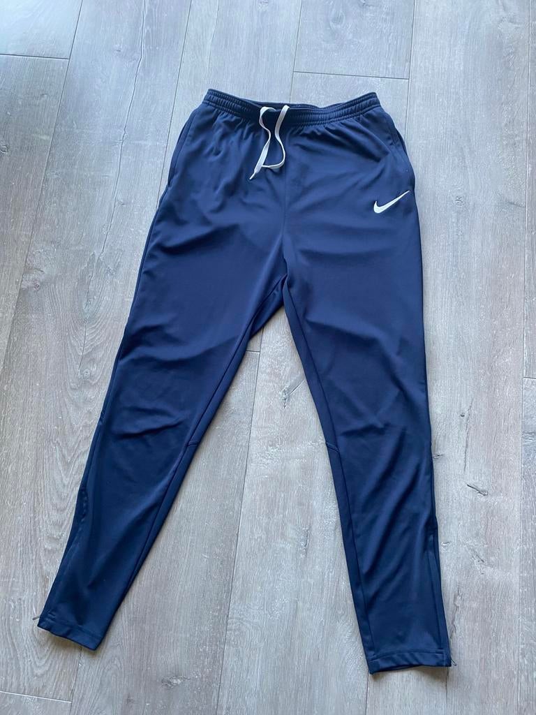Nike meisjes trainingsbroek blauw maat 158/164/170, Kinderen en Baby's, Kinderkleding | Maat 158, Ophalen of Verzenden, Gebruikt