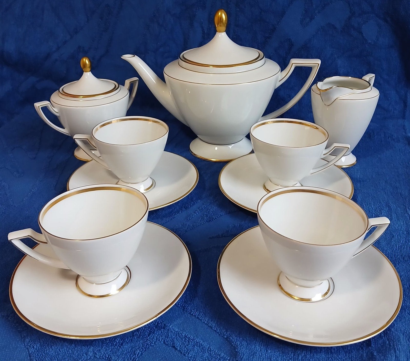 Elegant porseleinen theeservies met gouden accenten, Ophalen of Verzenden