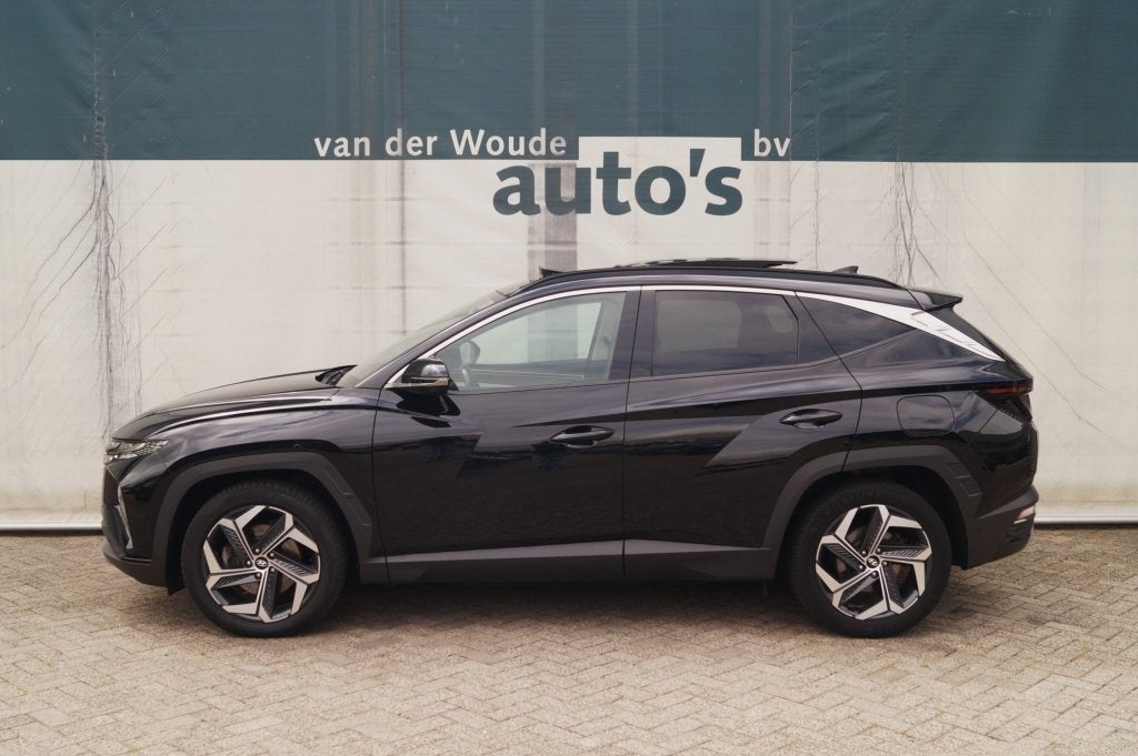 Hyundai Tucson 1.6 T-GDI PHEV Premium Sky -LEER-PANO-TREKHAA, Auto's, Automaat, 14 kWh, Gebruikt, Euro 6