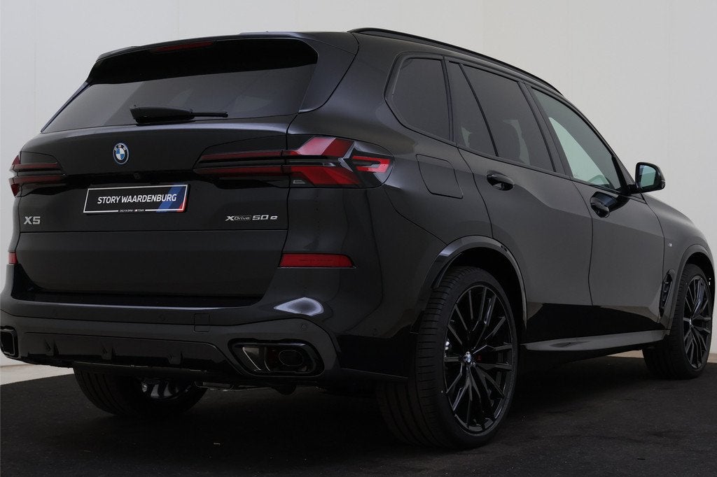 BMW X5 xDrive50e M Sport Automaat / Trekhaak / Panoramadak S, Auto's, BMW, Automaat, 2395 kg, Zwart, Leder