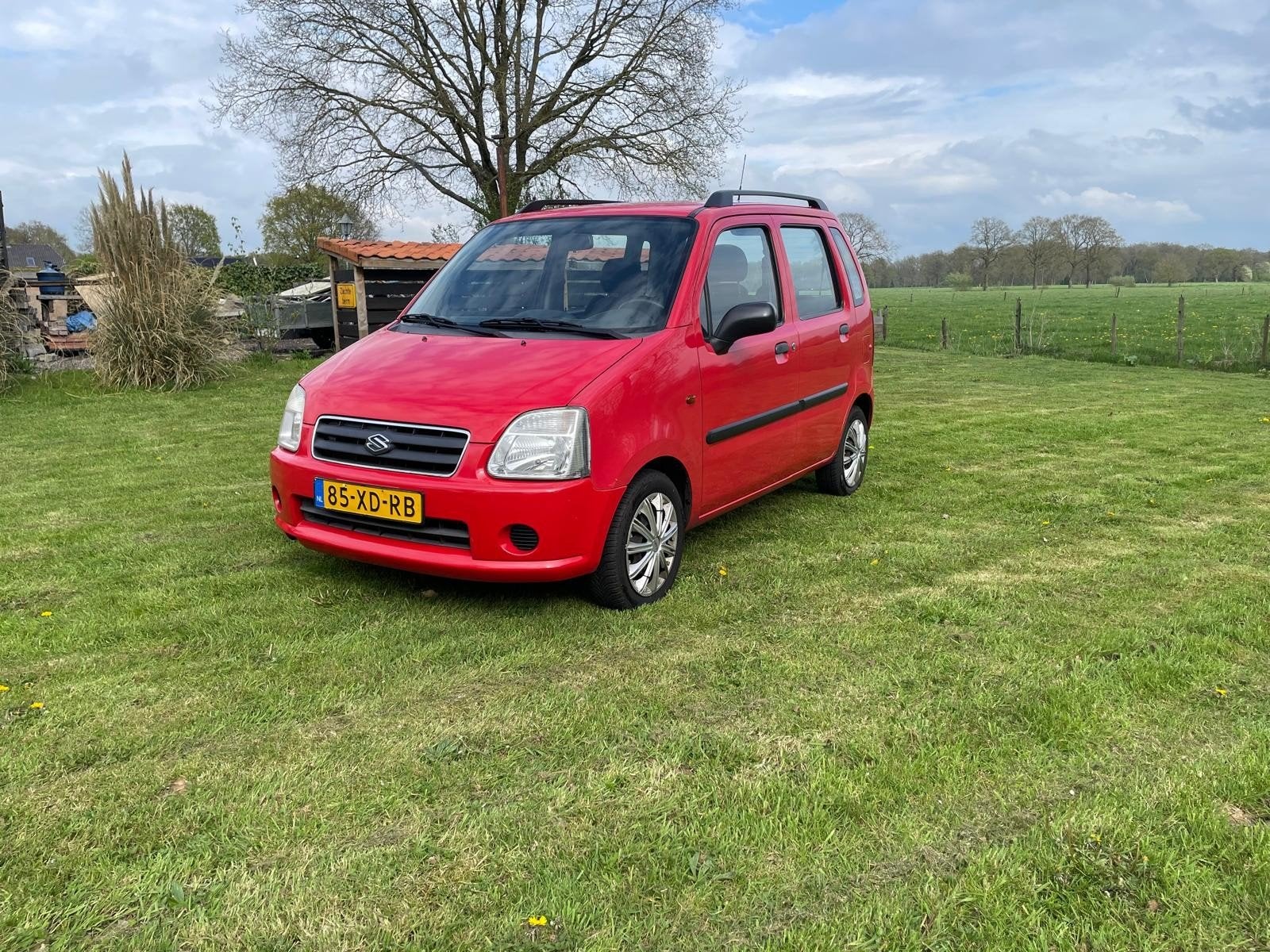 Suzuki Wagon R+ 1.0 2007 Rood, Auto's, Suzuki, Voorwielaandrijving, 31 €/maand, Wagon R+, Origineel Nederlands