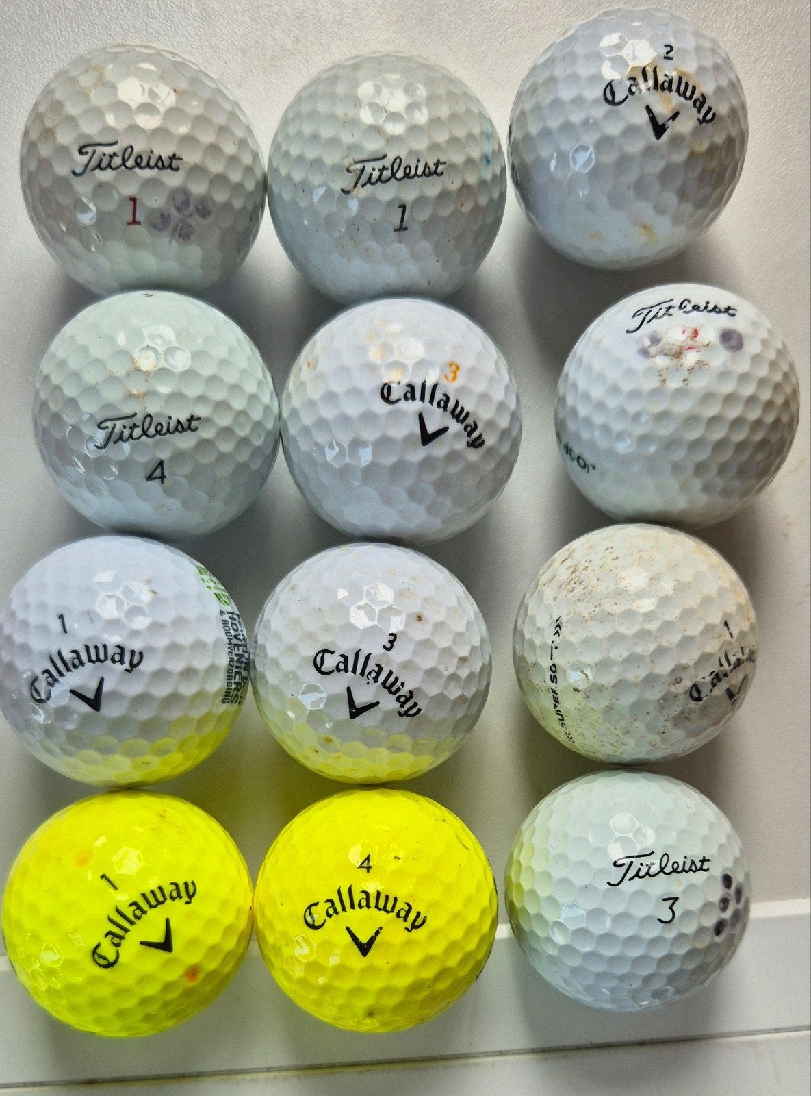 12 golfballen: Titleist en Callaway (gebruikt), Sport en Fitness, Golf, Ophalen of Verzenden, Gebruikt, Bal(len), Callaway