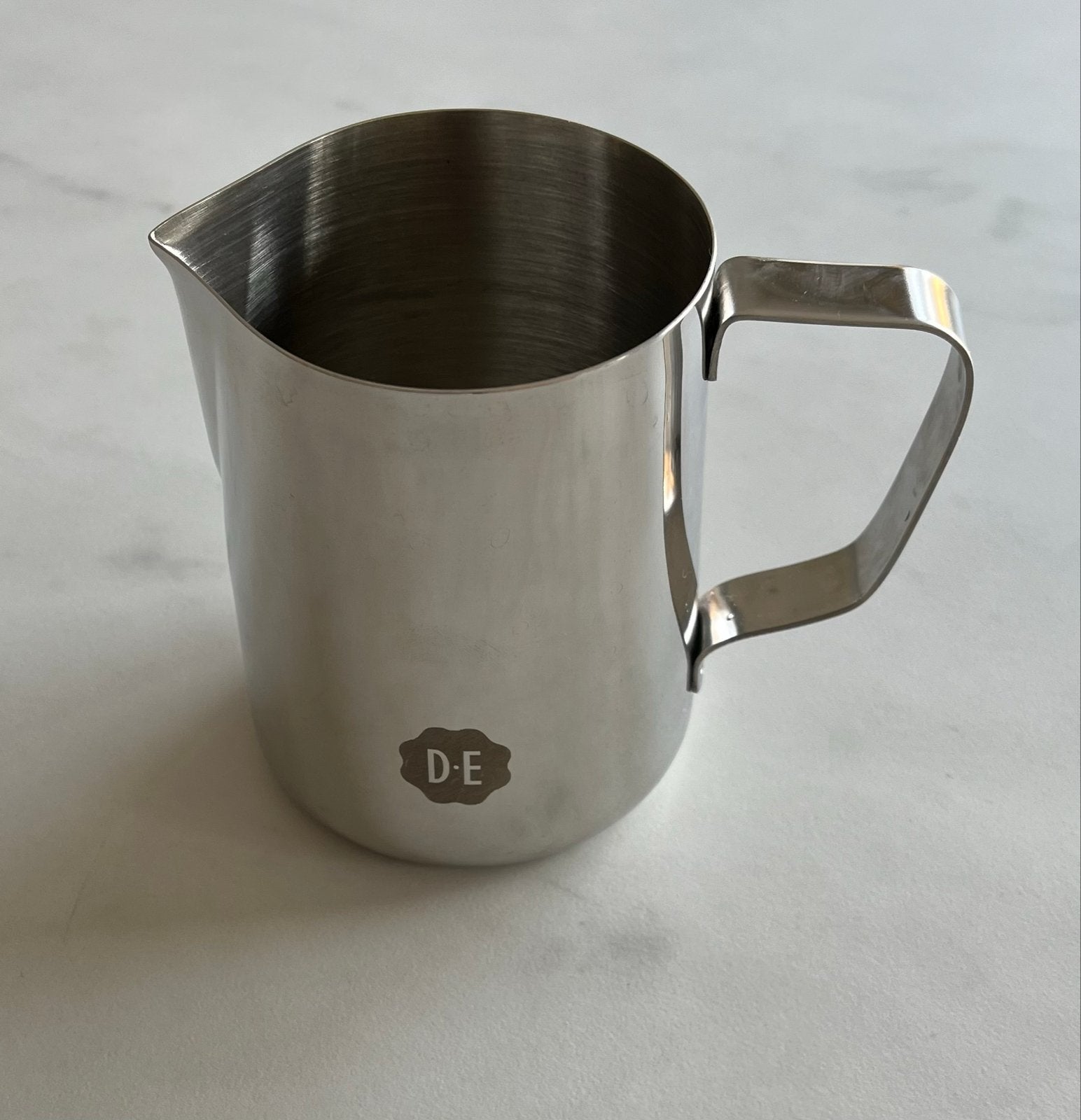 Douwe Egberts RVS melkopschuim kannetje, Witgoed en Apparatuur, Melkopschuimers, Ophalen of Verzenden, Zo goed als nieuw, Handmatige melkopschuimer