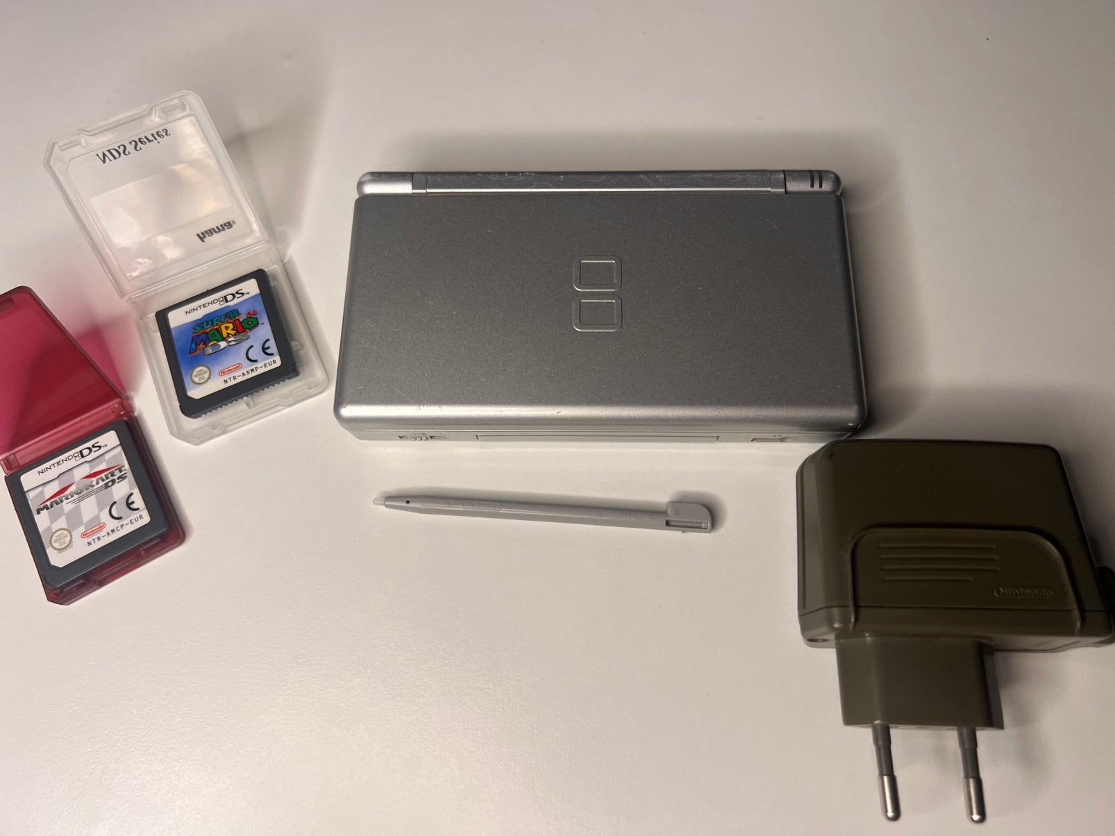 Nintendo DS Lite Zilver met games, Ophalen of Verzenden, Zilver, DS Lite, Gebruikt