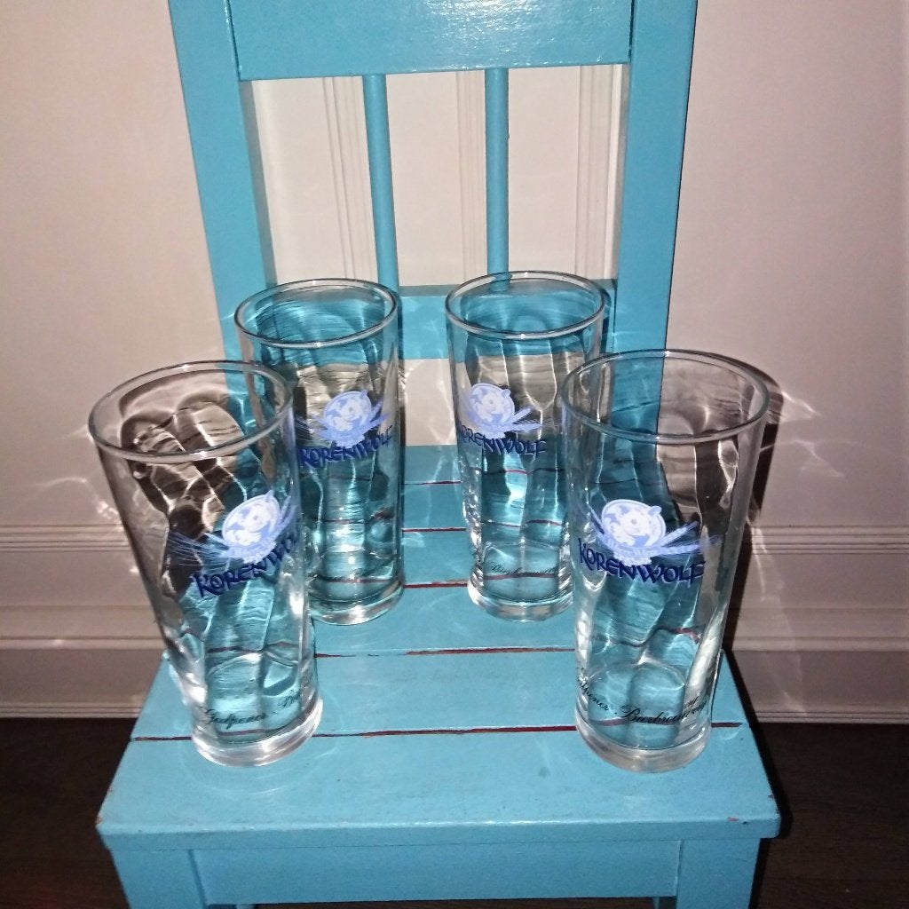 Gulpener korenwolf bierglazen lichtblauw logo 4 stuks, Ophalen, Zo goed als nieuw, Glas of Glazen, Gulpener