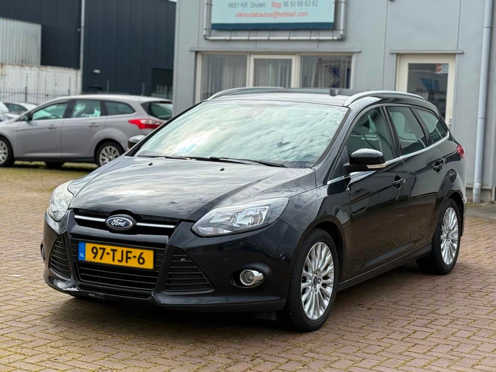 Ford Focus Wagon 1.6 EcoBoost Lease Titanium Export, Gebruikt, 150 pk, Zwart, Origineel Nederlands