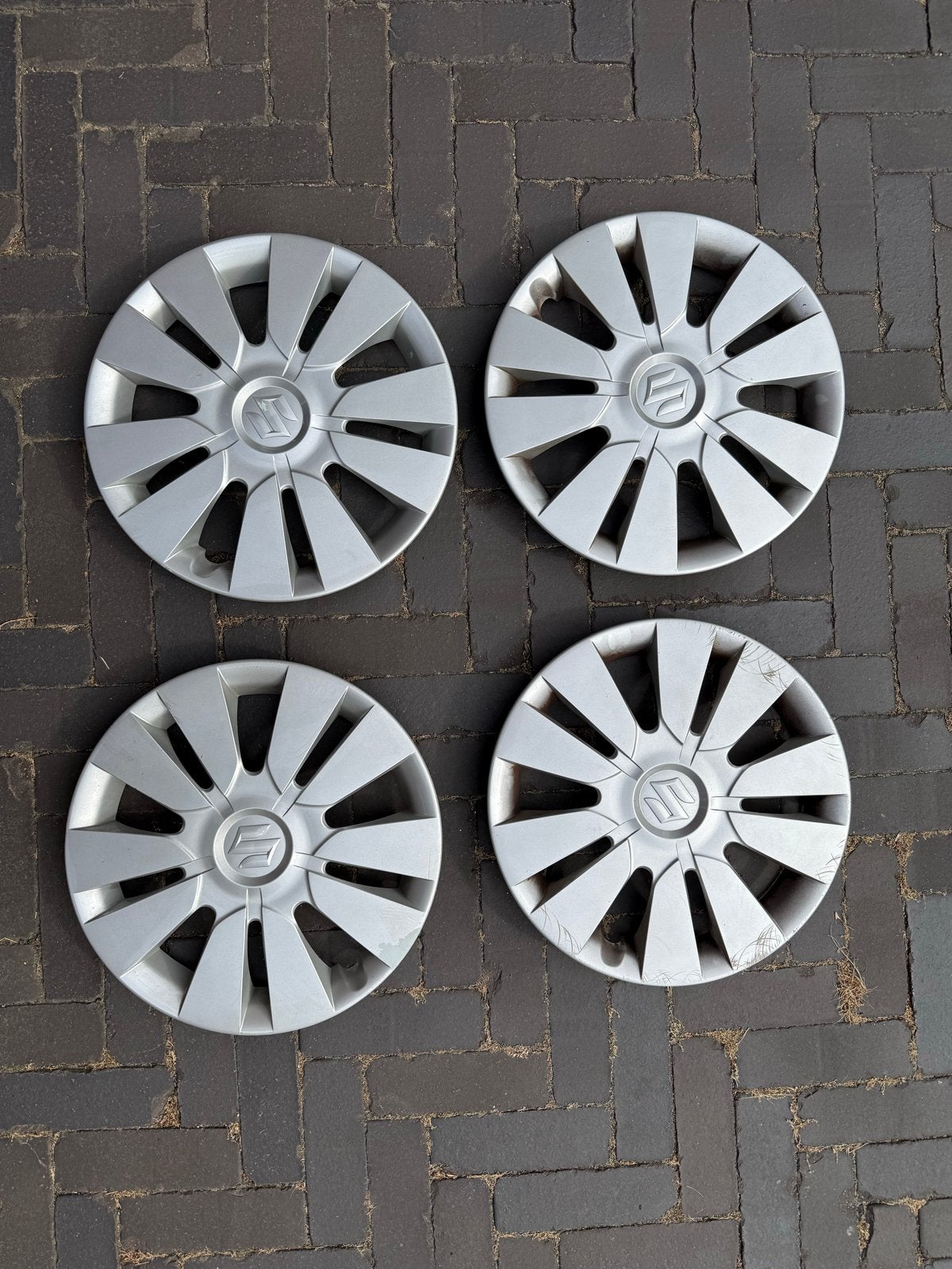 Originele wieldoppen Suzuki Alto, 14 inch - Gebruikt, Ophalen of Verzenden, Gebruikt
