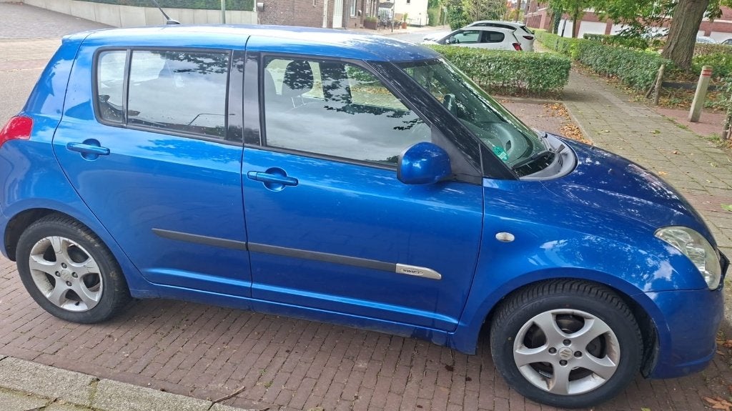 Suzuki Swift 1.3 5DRS 2007 Blauw, Voorwielaandrijving, Stof, 40 €/maand, Zwart