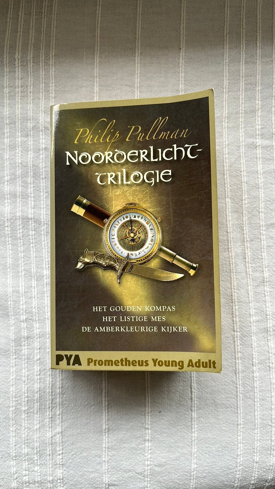 Philip Pullman - Noorderlichttrilogie paperback, Ophalen of Verzenden, Zo goed als nieuw