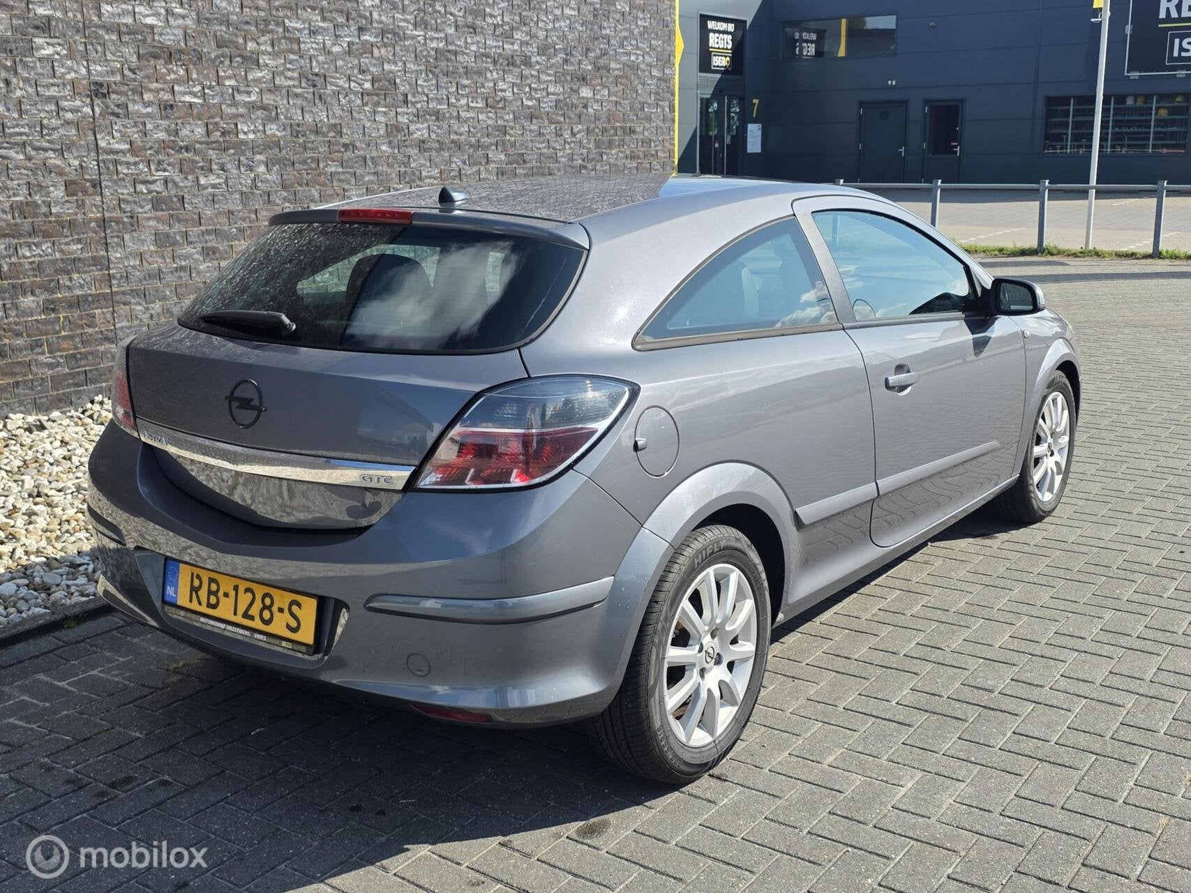 Opel Astra GTC 1.4 Cosmo - Airco - Cruise - Automaat!, Auto's, Sportstoelen, Gebruikt, 4 cilinders, 49 €/maand