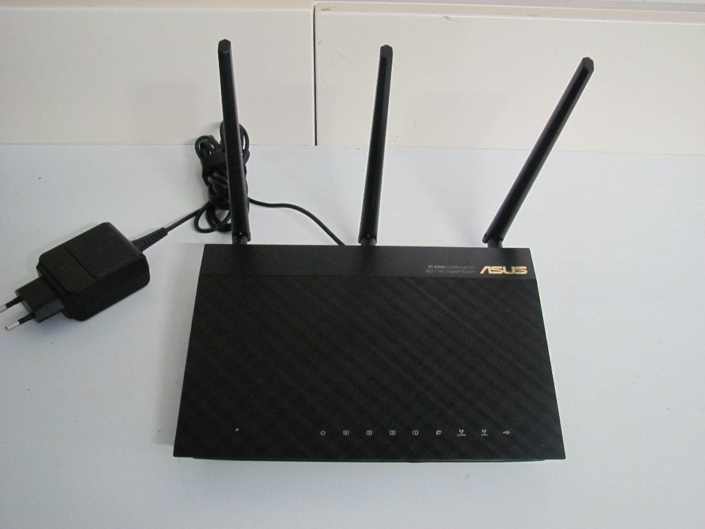 Asus rt-ac66u dual band 3x3 802.11 ac Gigabit Router, Ophalen of Verzenden, Zo goed als nieuw, Router met modem, Asus
