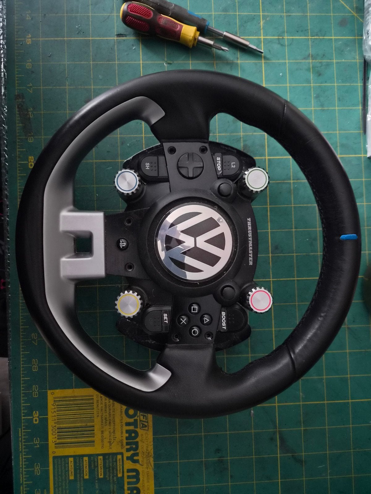 Thrustmaster TGT 2 met extra stuur en load cell pedalen, Ophalen