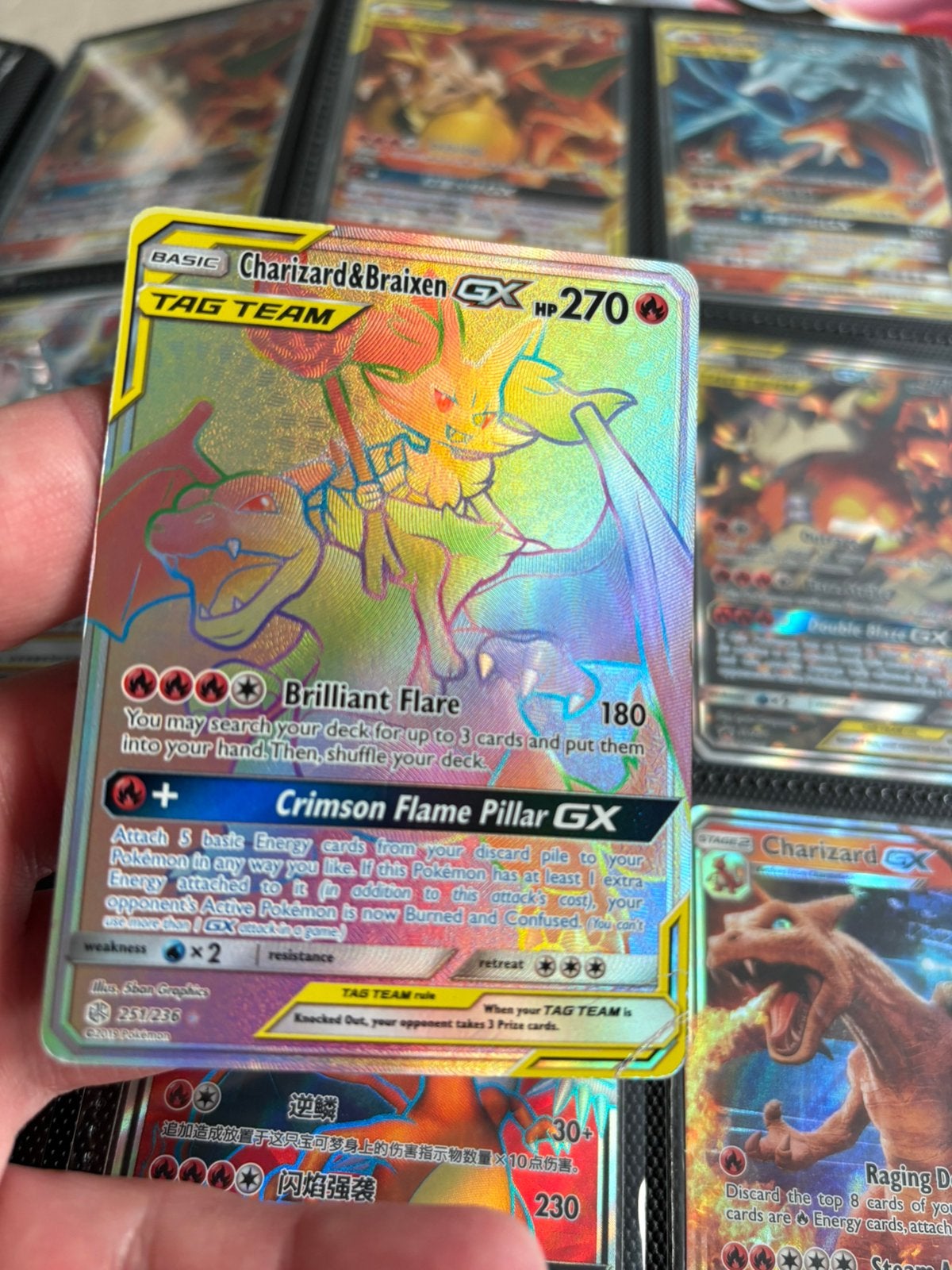 Charizard en braixen gx rainbow, Ophalen of Verzenden, Zo goed als nieuw, Meerdere kaarten, Foil
