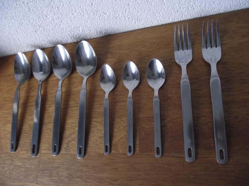 9 vintage RVS bestek met ophangoog motief Monza 1970 p stuk, Ophalen of Verzenden, Zo goed als nieuw, Rvs of Chroom, Vaatwasserbestendig
