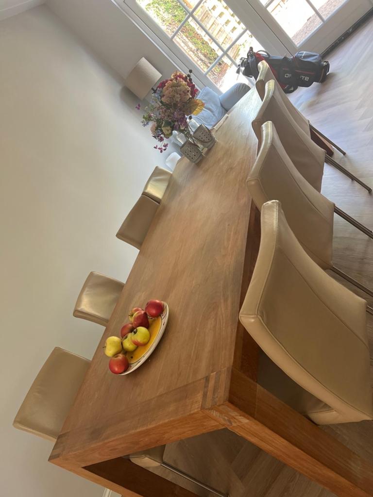 Teakhouten eettafel (250x100) met 8 beige leren stoelen, Ophalen, Gebruikt, 100 tot 150 cm, Teakhout