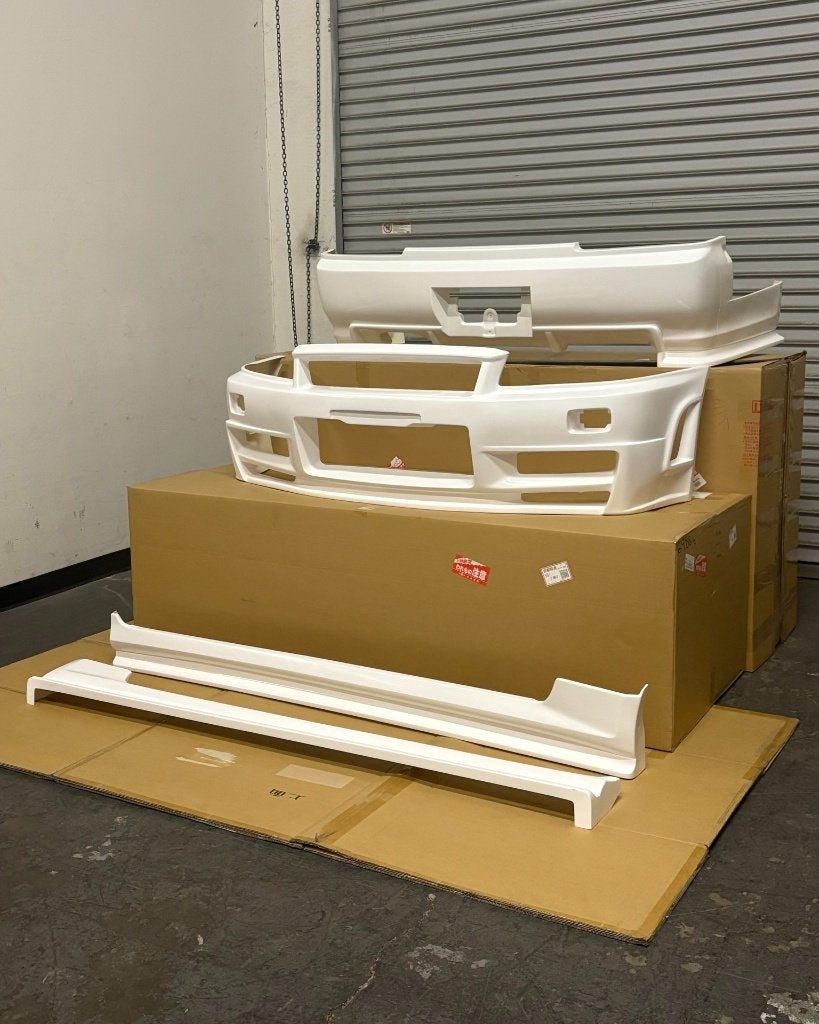 Shaft Auto Service bodykit - Nissan Skyline R34 Sedan ER34, Auto diversen, Ophalen of Verzenden