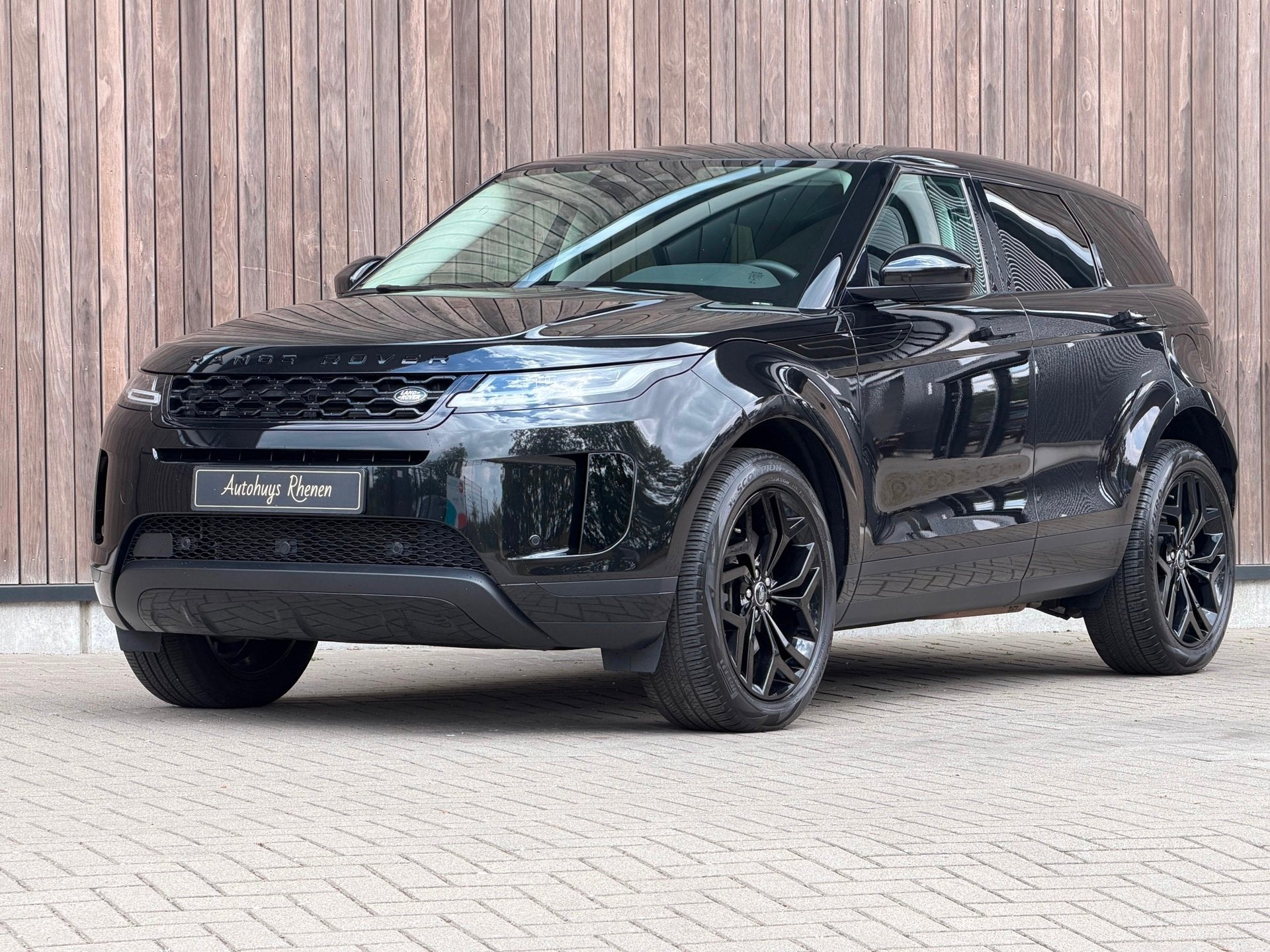 Land Rover Range Rover Evoque 1.5 P300e AWD R-Dynamic SE, Auto's, Land Rover, 309 pk, 1497 cc, Gebruikt, Zwart