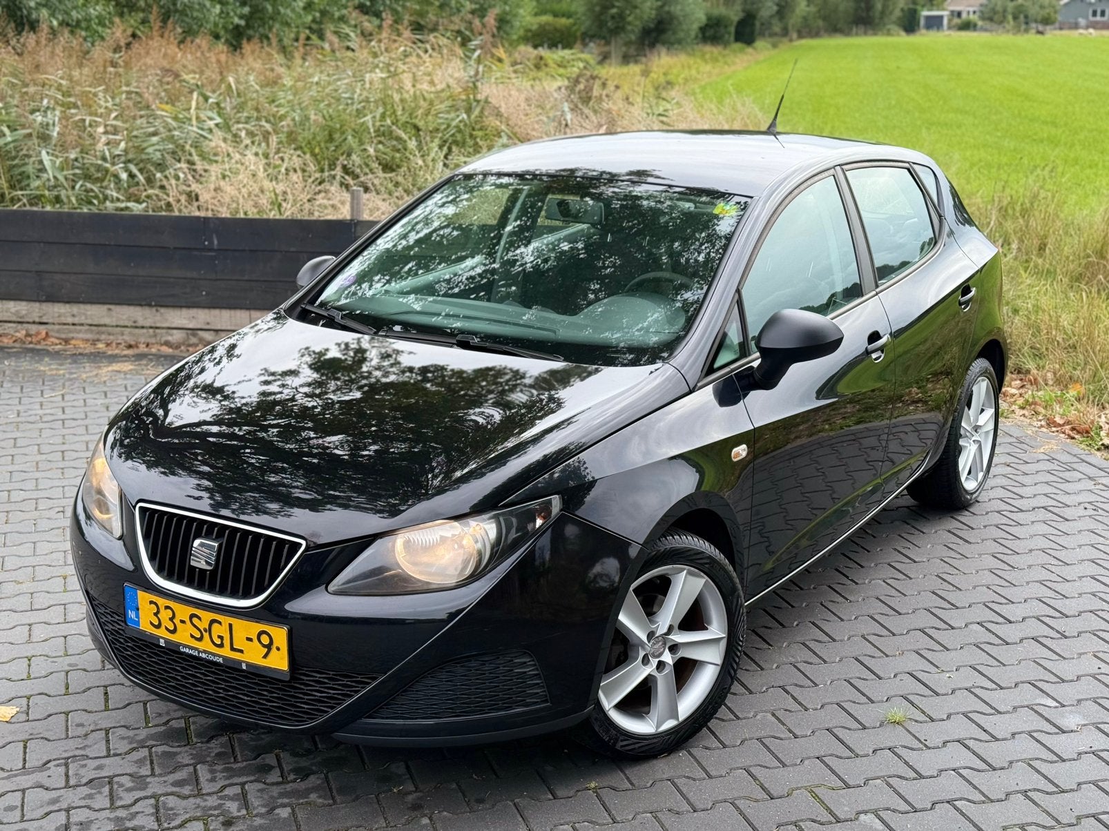 Seat Ibiza Club 1.2  5DRS 2011 Zwart Airco, Auto's, Seat, Voorwielaandrijving, Stof, 1198 cc, Origineel Nederlands
