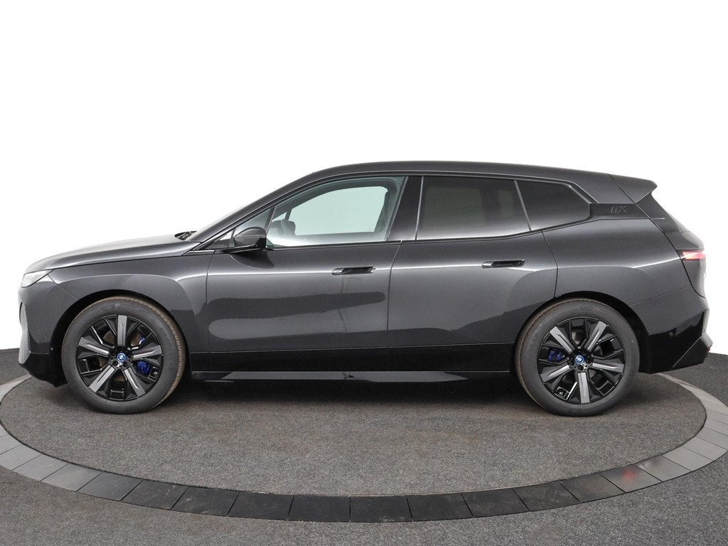 BMW iX xDrive40 | Sport Package | Panoramadak | Harman/Kardo, Auto's, Stof, Gebruikt, Met garantie (alle), Origineel Nederlands