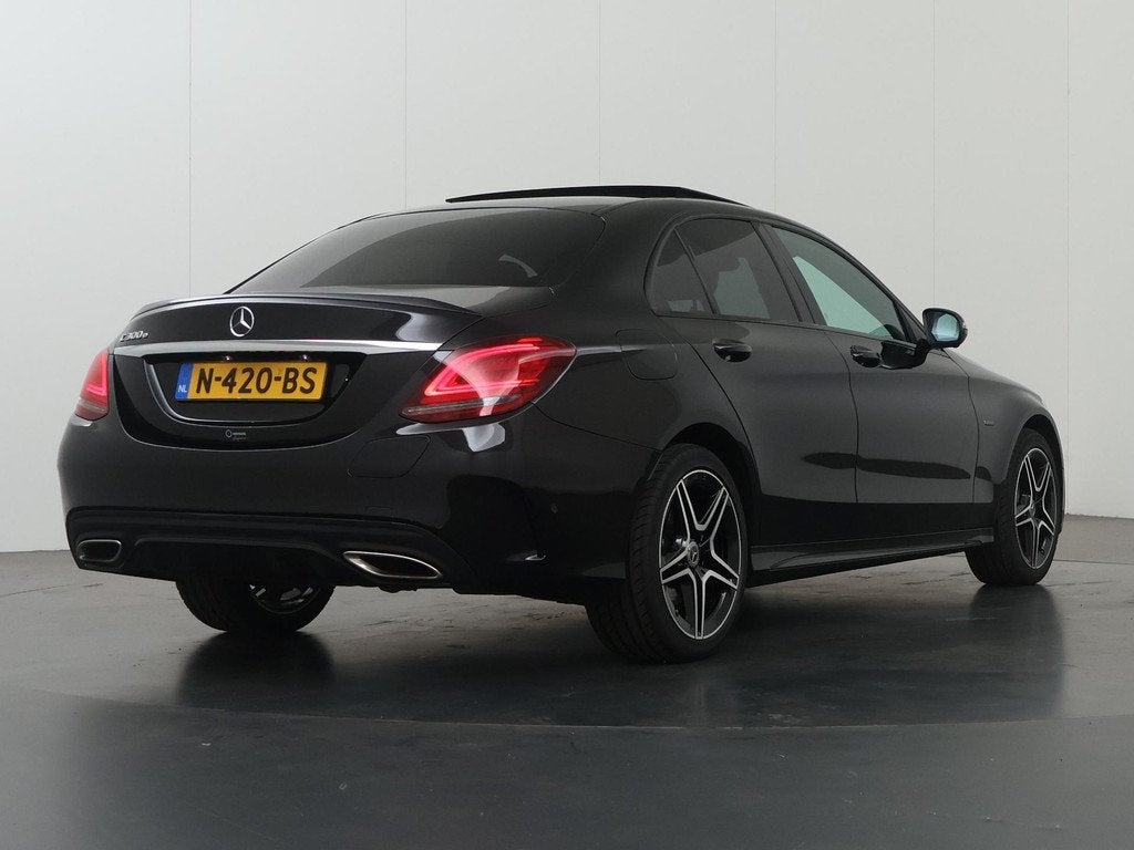 Mercedes-Benz C-klasse 300 e Business Solution AMG Limited |, Auto's, Mercedes-Benz, Automaat, 320 pk, Leder en Stof, Zwart