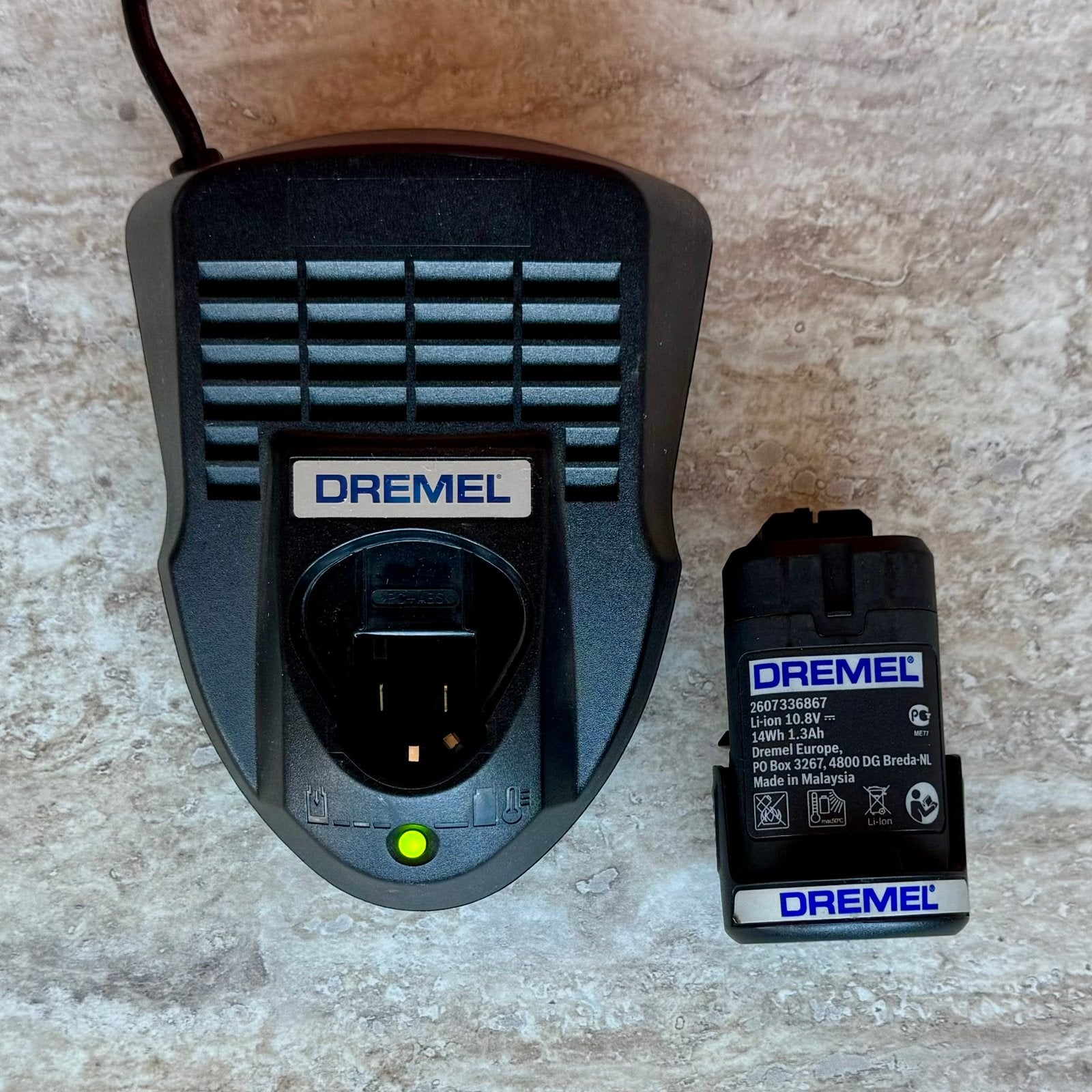 Accu en snellader Dremel, Ophalen of Verzenden, Gebruikt