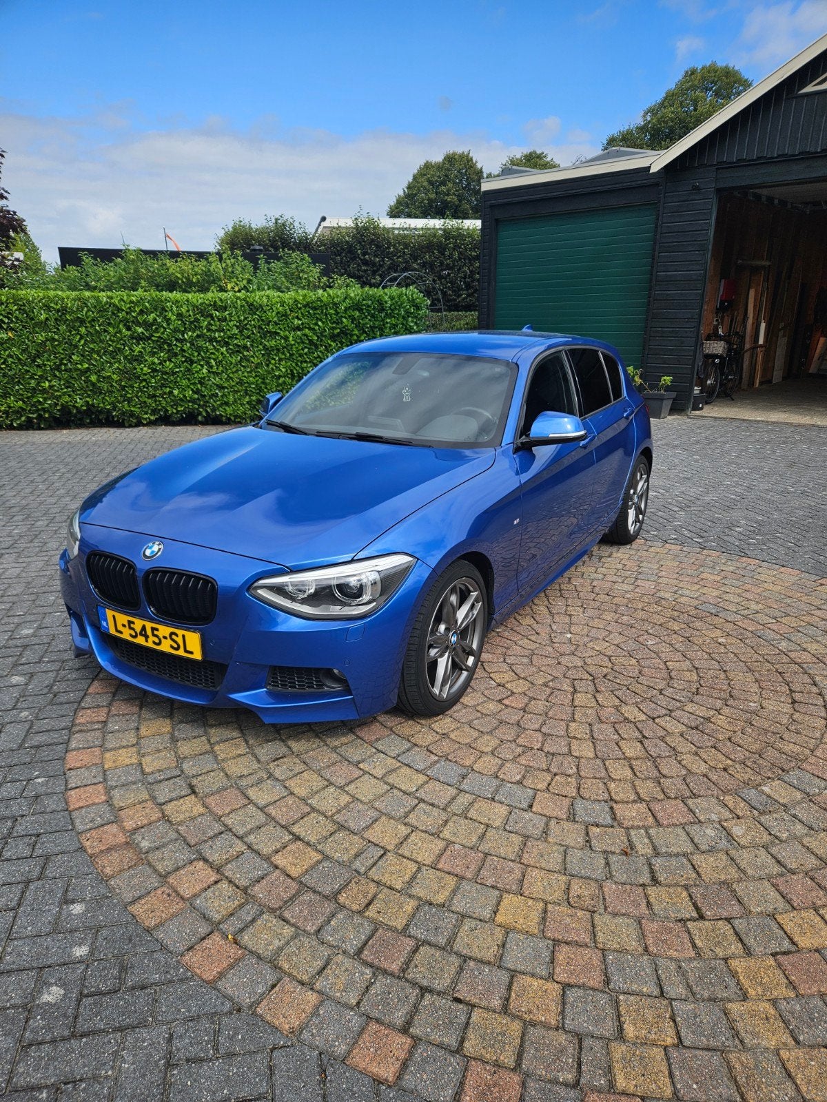 BMW 1-Serie 116i 200PK 5D 2014 Blauw M pakket, Auto's, 1-Serie, Zwart, 4 cilinders, Blauw