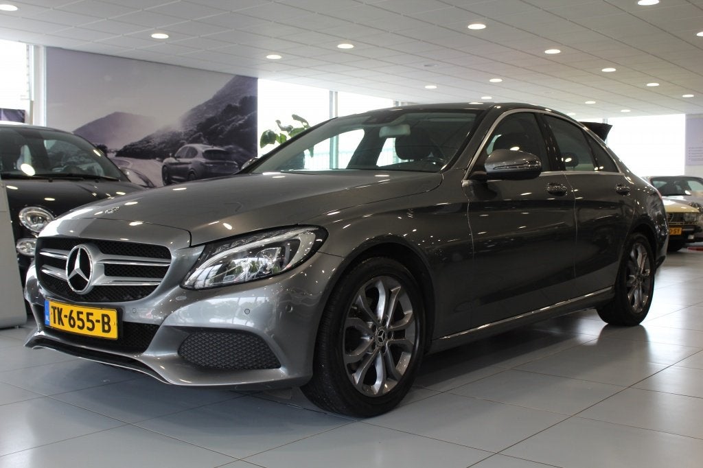 Mercedes-Benz C-Klasse 180 Bus. Sol. AMG/PANORAMADAK/CRUISE/, Auto's, Dealer onderhouden, 4 cilinders, 157 pk, Leder en Stof