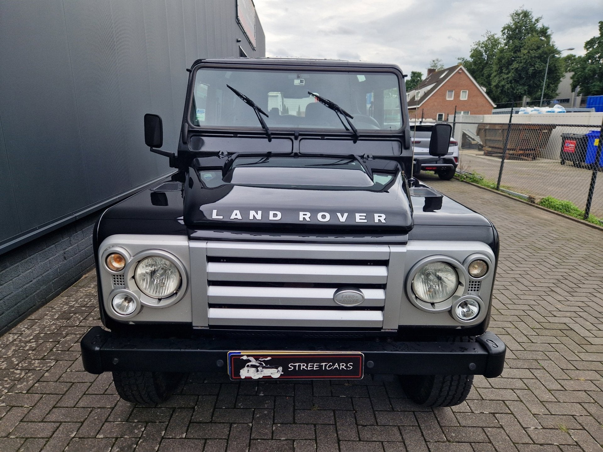 Land Rover Defender 2.4 TD 110 7Persoons SVX 60 Anniversery, Auto's, 1940 kg, Gebruikt, Zwart, 4 cilinders