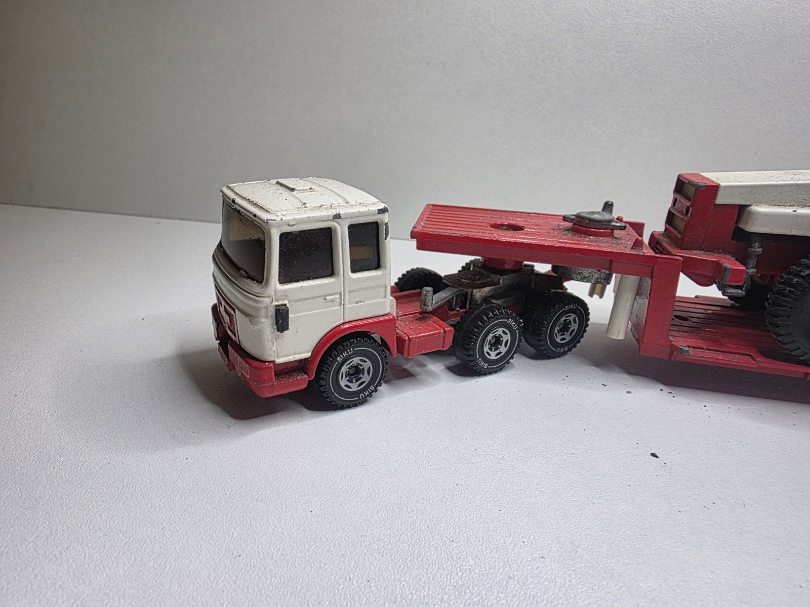 man dieplader en shovel, Ophalen of Verzenden, Gebruikt, Bus of Vrachtwagen, SIKU