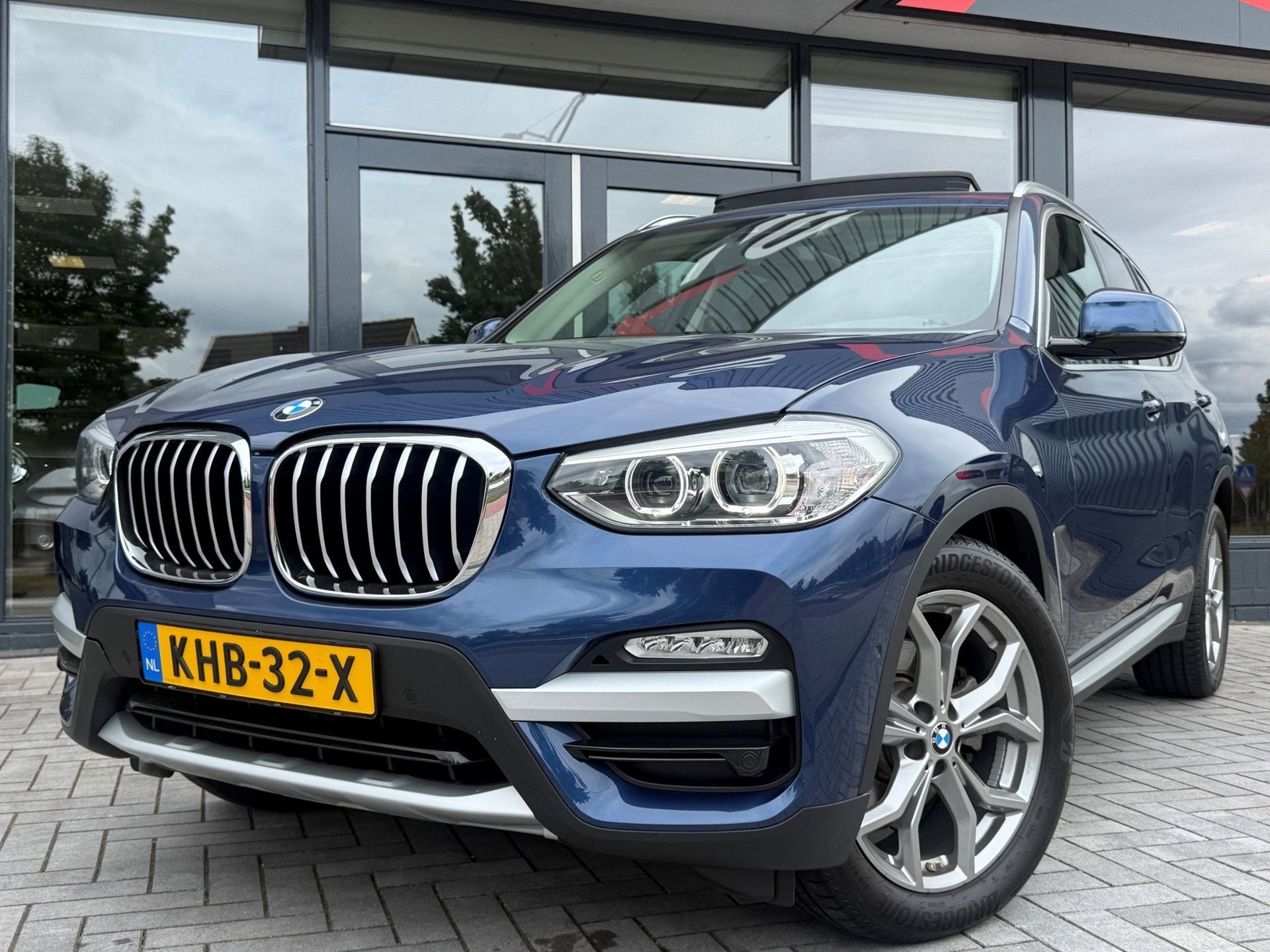 BMW X3 XDrive20i High Executive Pano HUD Leder Camera, Automaat, Zwart, 4 cilinders, Blauw