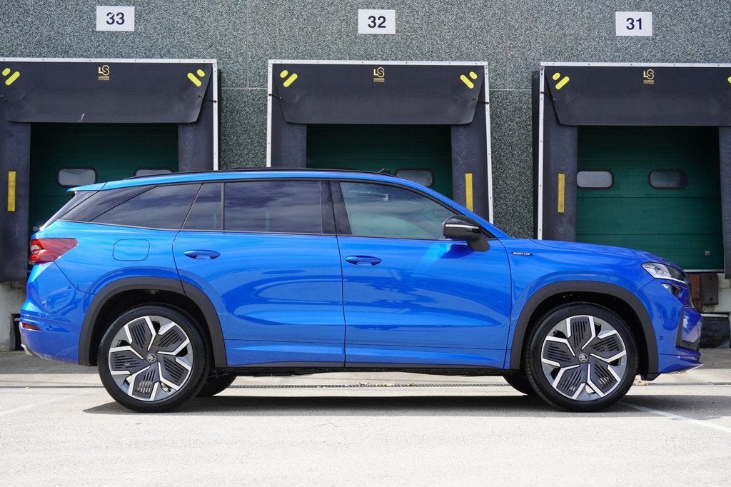 Skoda Kodiaq 1.5 TSI 204pk PHEV Sportline Business | Panoram, Auto's, Skoda, 12 maanden, 1498 cc, 4 cilinders, Blauw