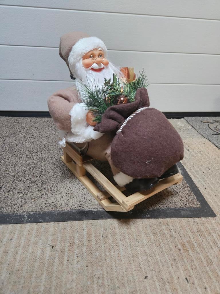 Kerstman op slee decoratie, Ophalen