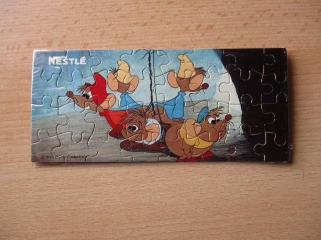 Disney Assepoester mini puzzeltje  Nestle  8x17.5cm, Ophalen of Verzenden, Overige figuren, Zo goed als nieuw, Beeldje of Figuurtje