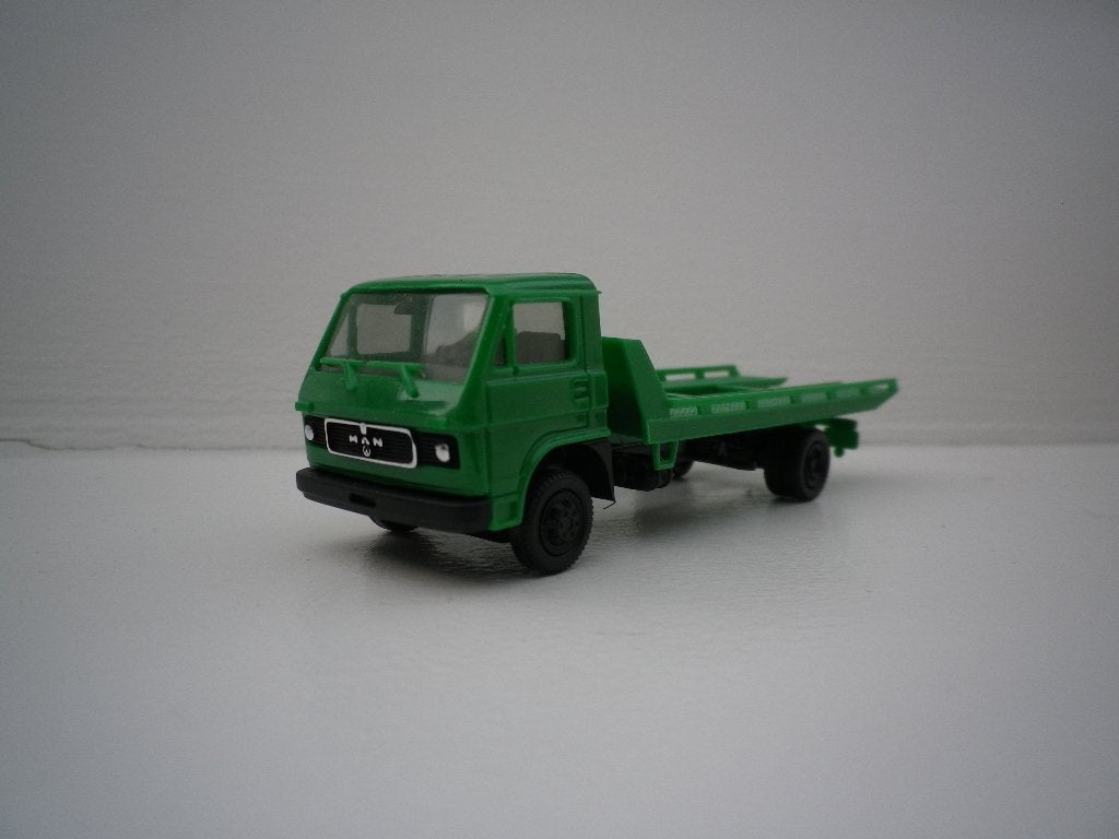 Herpa MAN VW afsleepwagen groen., Ophalen of Verzenden, Zo goed als nieuw, Bus of Vrachtwagen, Herpa