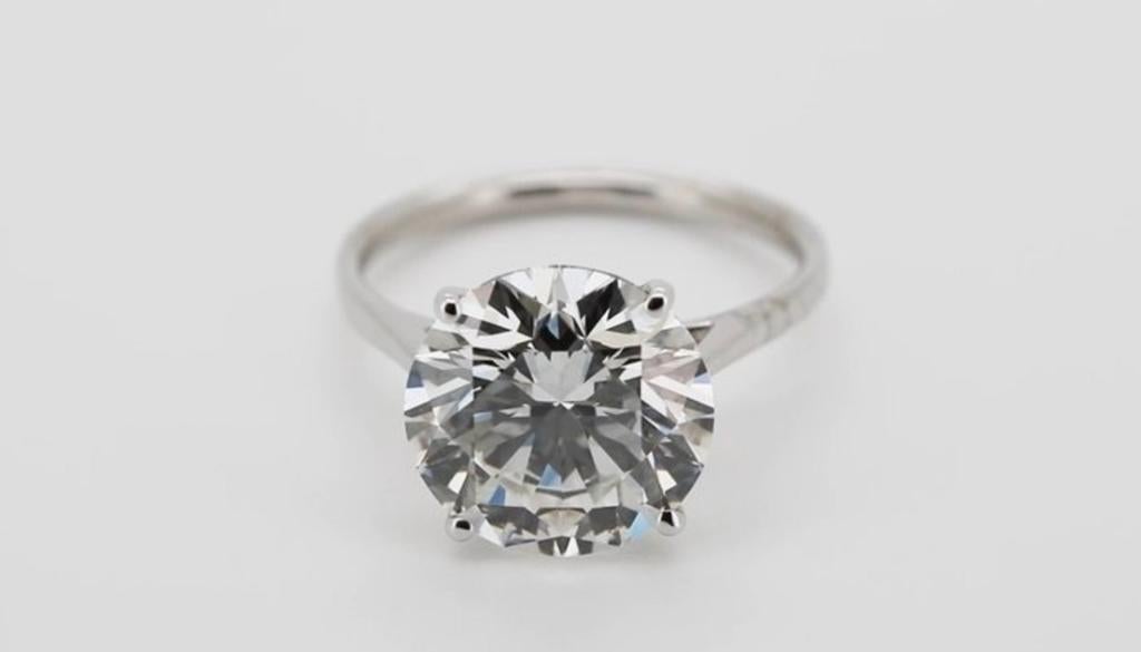 Uiterst exclusief: 14k gouden ring met 7 karaat diamant, Ophalen of Verzenden, Zo goed als nieuw, 17 tot 18, Dame