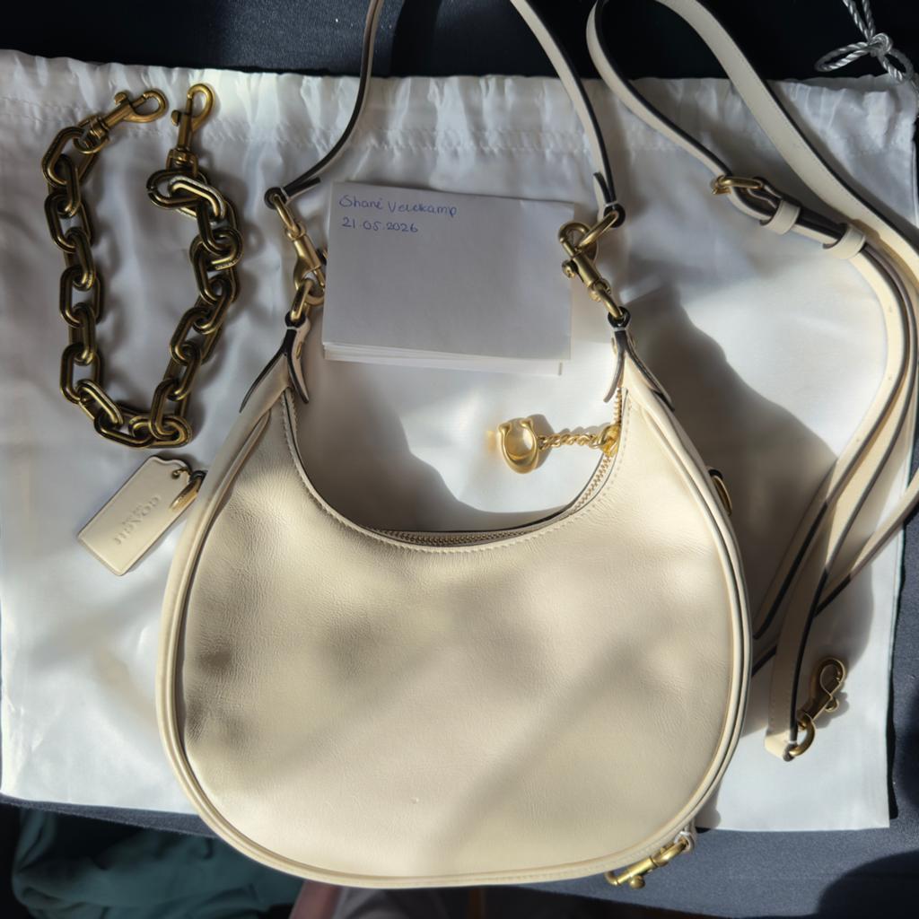 Leren Coach Jonie 22 Tas met Accessoires, Sieraden, Tassen en Uiterlijk, Tassen | Damestassen, Schoudertasje, Beige, Ophalen of Verzenden