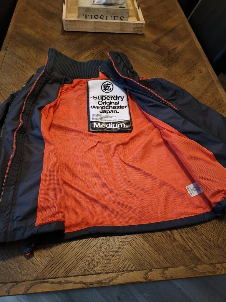 Superdry Windcheater jas heren M grijs/oranje perfecte staat, Maat 48/50 (M), Ophalen of Verzenden, Zo goed als nieuw, Grijs