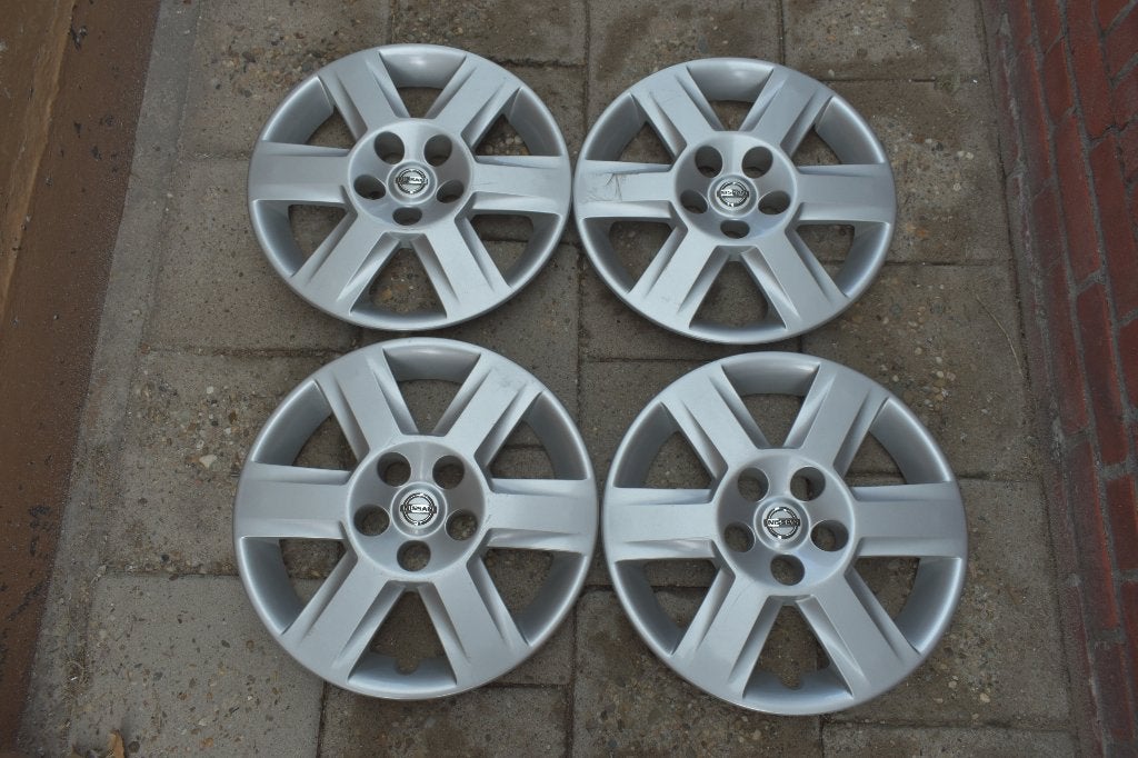 Set van 4 originele wieldoppen Nissan Qashqai 16 inch, Ophalen of Verzenden, Gebruikt