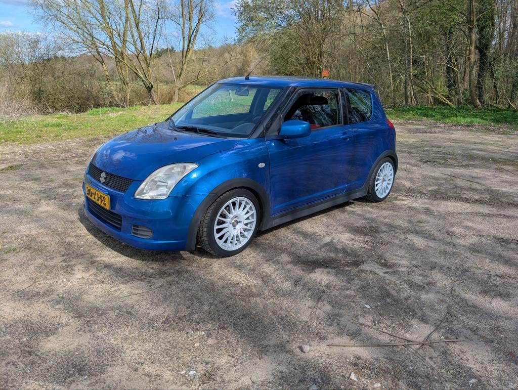 Suzuki Swift 1.3 3D 2007 Blauw, Stof, 31 €/maand, Swift, Origineel Nederlands