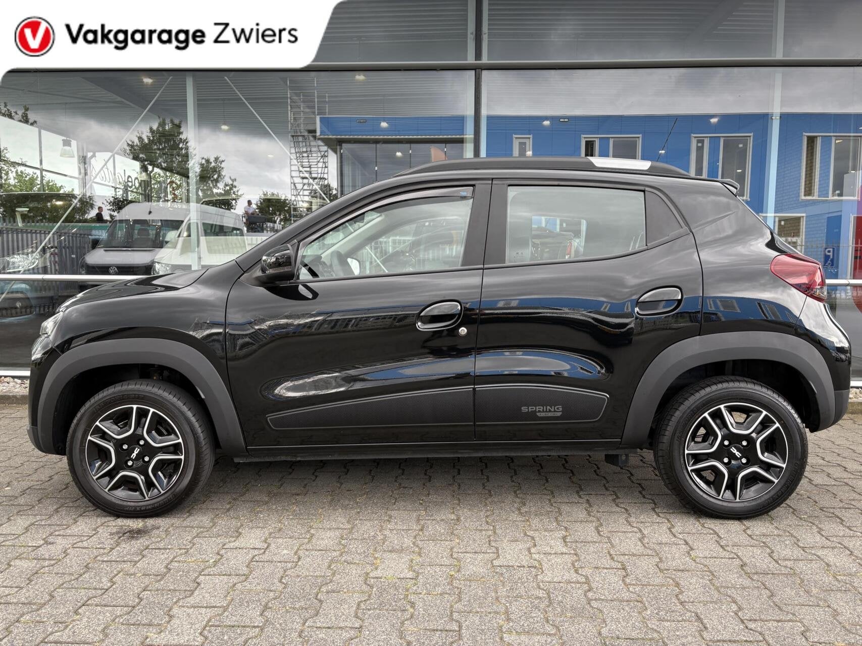 Dacia Spring Expression 27 kWh SOH 92%|Navigatie|Camera|PDC|, Auto's, Dacia, Gebruikt, Parkeersensor, 38 min, Zwart