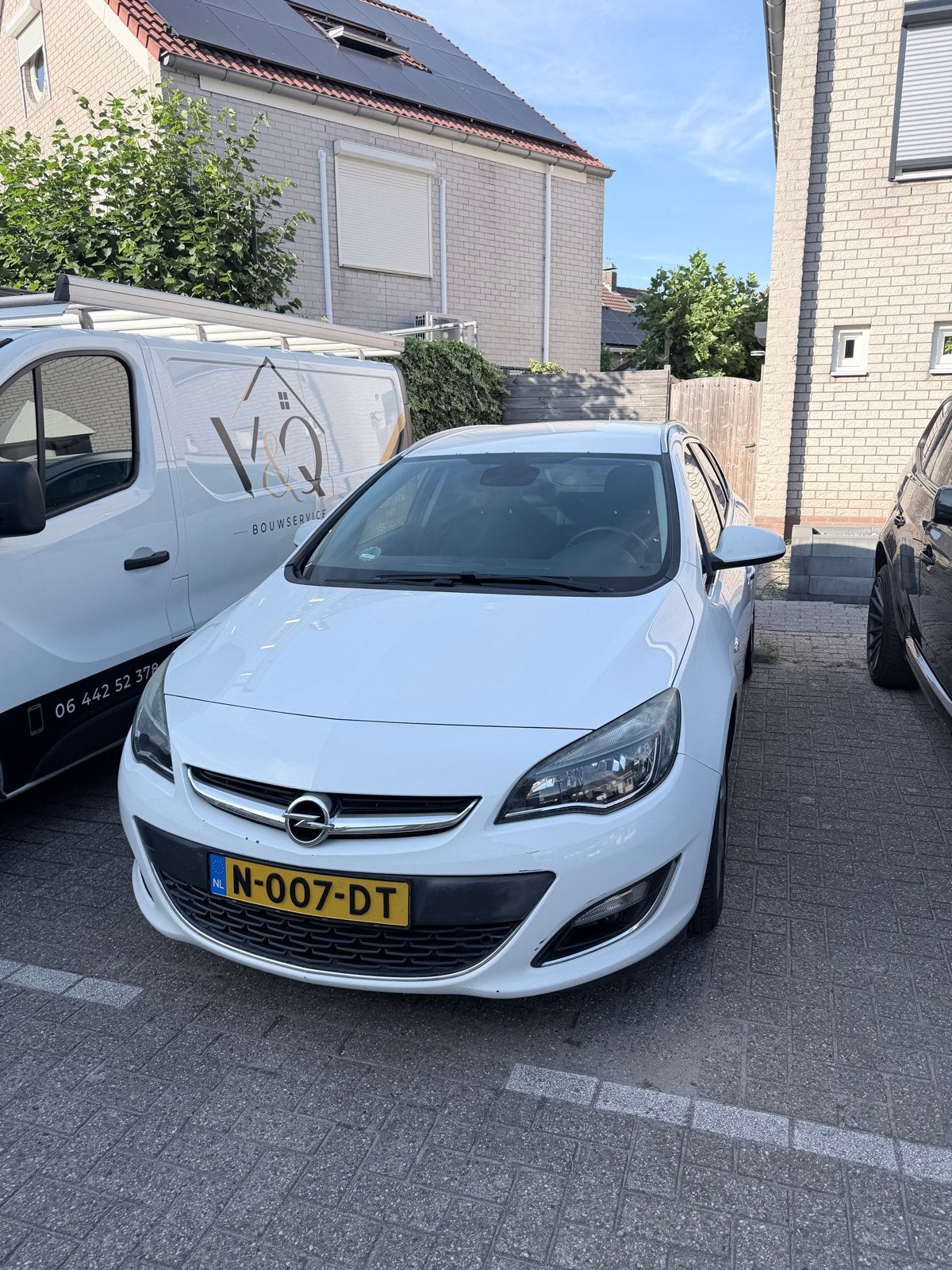 Opel Astra 1.6 Ecotec 115pk 2012 Wit, Auto's, Zwart, 4 cilinders, 700 kg, Leder en Stof