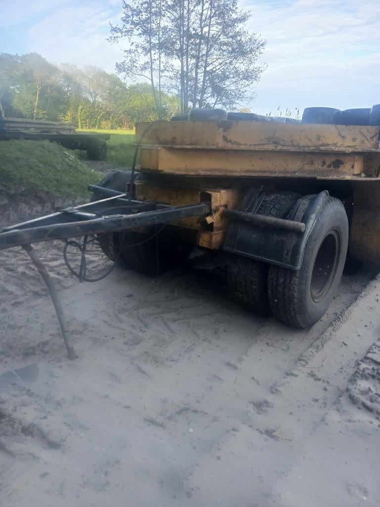 Dieplader met wat werk, Ophalen