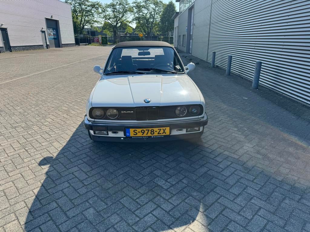 BMW e30 baur 1986 Wit, Auto's, BMW, Particulier, Benzine, Cabriolet, Handgeschakeld, Geïmporteerd, Wit, Zwart, Leder, Achterwielaandrijving