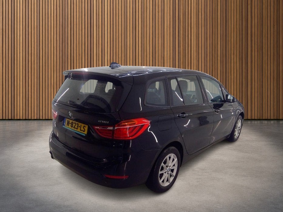 BMW 2 Serie Gran Tourer 216i 7p. Business Edition Plus 1e-Ei, Auto's, 12 maanden, Gebruikt, 7 stoelen, Zwart