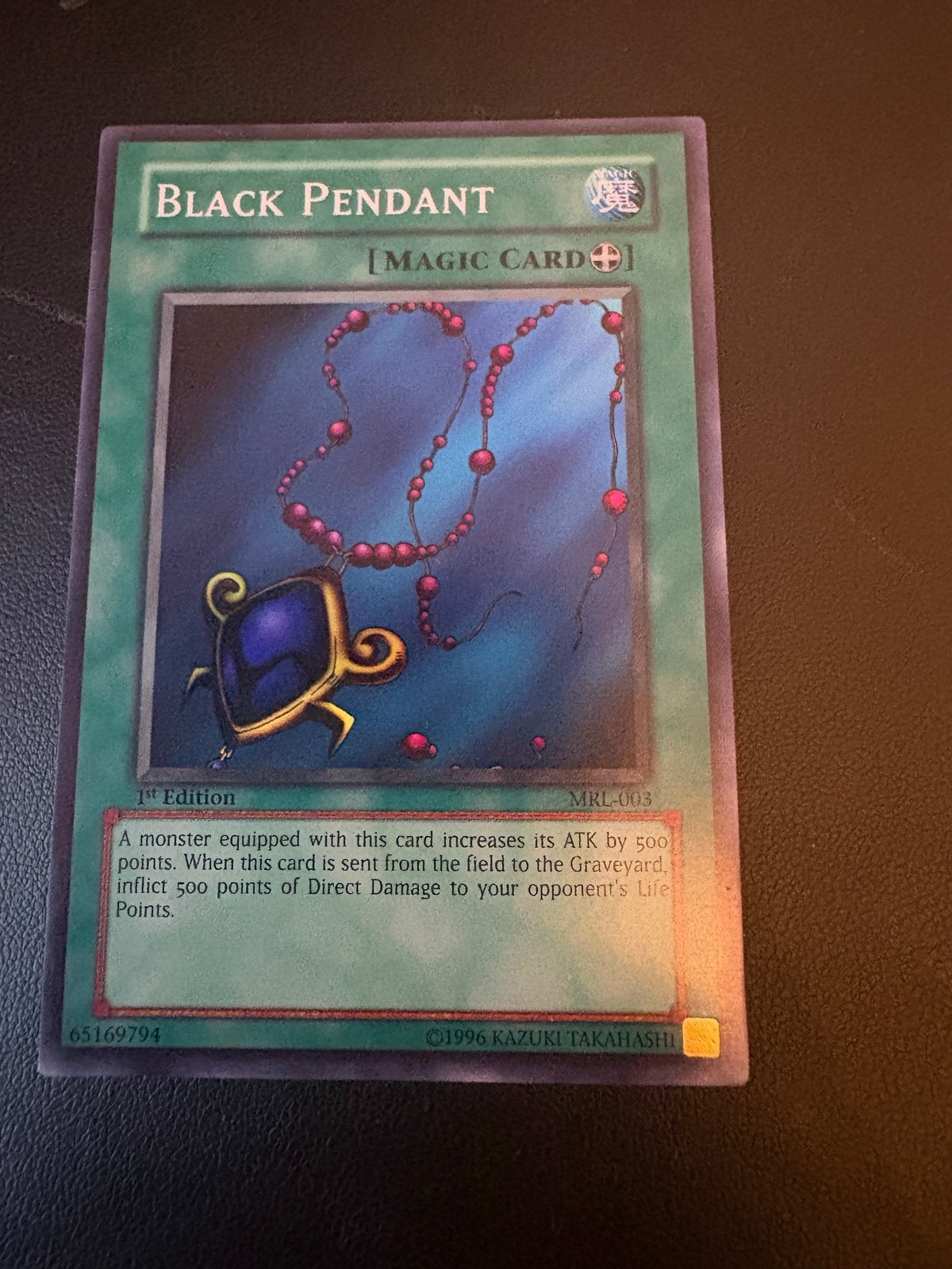 Yu-Gi-Oh! Black Pendant MRL-003 1st Edition Magic Card, Ophalen of Verzenden, Zo goed als nieuw, Losse kaart
