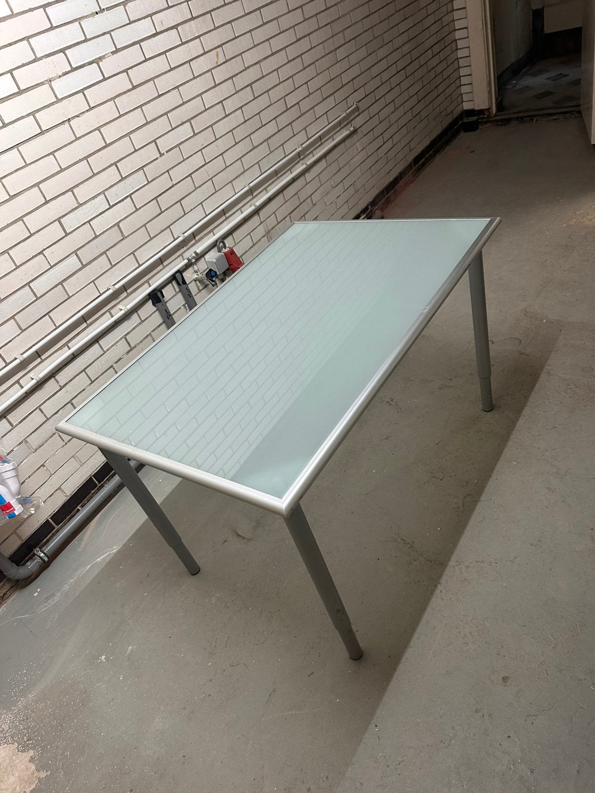 Glazen tafel met RVS poten – 116 x 78 cm, Huis en Inrichting, Tafels | Eettafels, Ophalen, Gebruikt, 100 tot 150 cm, 50 tot 100 cm